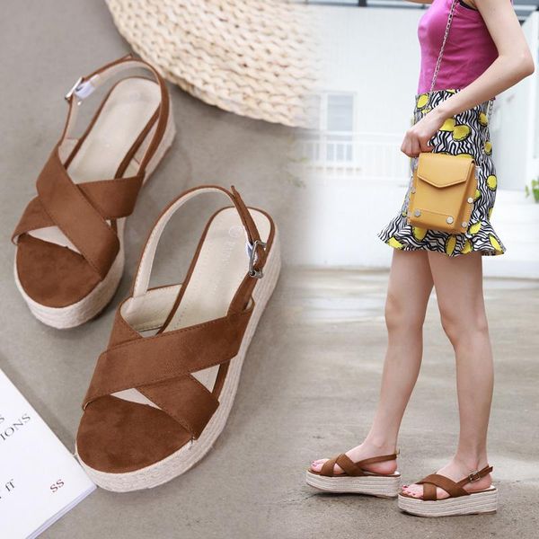 the women 6cm high heels 4.5m platform wedges black flock wild sandals female cross weaving rope dress beach rome shoes 
the women 6cm high heels 4.5m platform wedges black flock wild sandals female cross weaving rope dress beach rome shoes