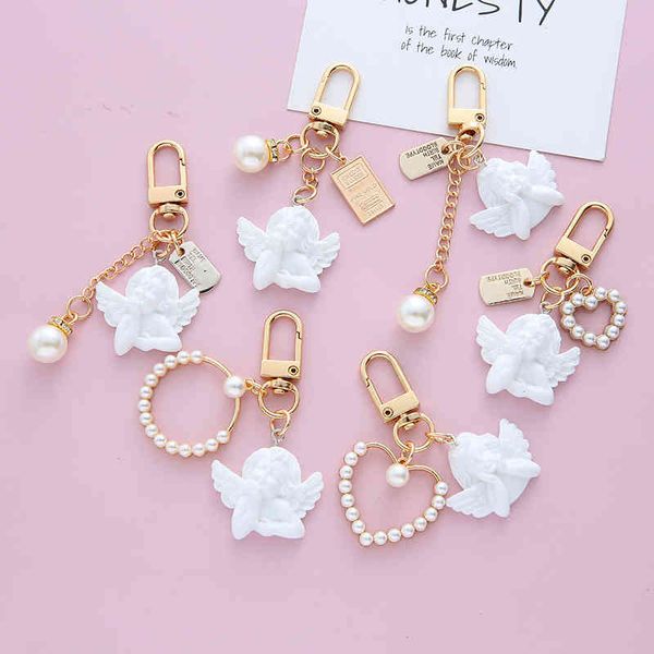 trendy key cut vintage white angel keychains for women girls mini pearl heart pendants gold color keyring bag car keys charm key chain, Slivery;golden 
trendy key cut vintage white angel keychains for women girls mini pearl heart pendants gold color keyring bag car keys charm key chain, Slivery;golden
