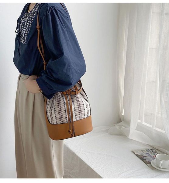 evening bags 2021 fashion patchwork bucket shoulder bag women brand designer stripe leather handbag string crossbody for bolso
evening bags 2021 fashion patchwork bucket shoulder bag women brand designer stripe leather handbag string crossbody for bolso
