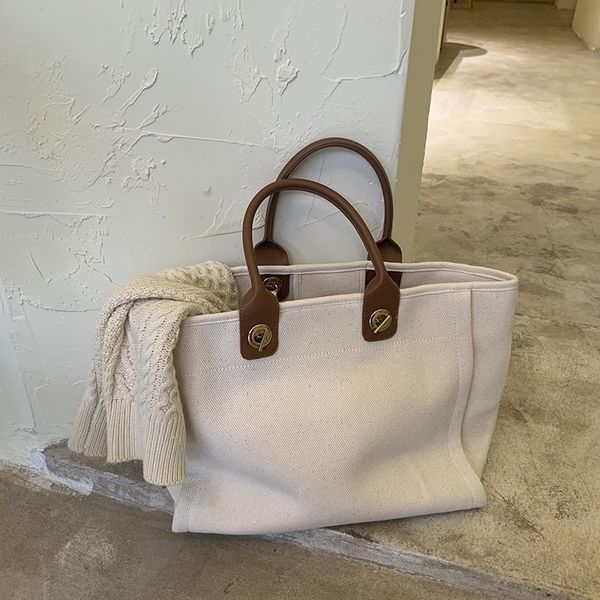 2022 new bag large one shoulder portable canvas capacity tote women's fashion trend handbag
2022 new bag large one shoulder portable canvas capacity tote women's fashion trend handbag