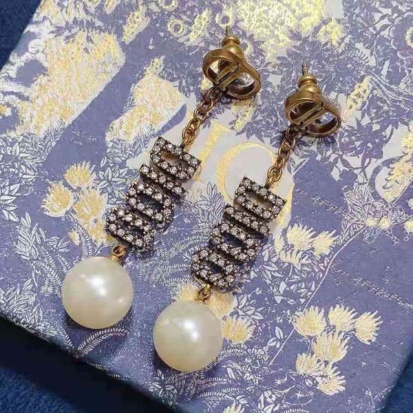 2021 new letter diamond pearl long d family earrings 925 sier needle women's, Golden
2021 new letter diamond pearl long d family earrings 925 sier needle women's, Golden