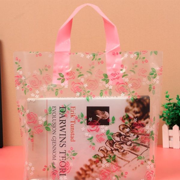 gift wrap 50pcs/lot clear plastic bag with handles pink flower printing clothing shopping bags
gift wrap 50pcs/lot clear plastic bag with handles pink flower printing clothing shopping bags
