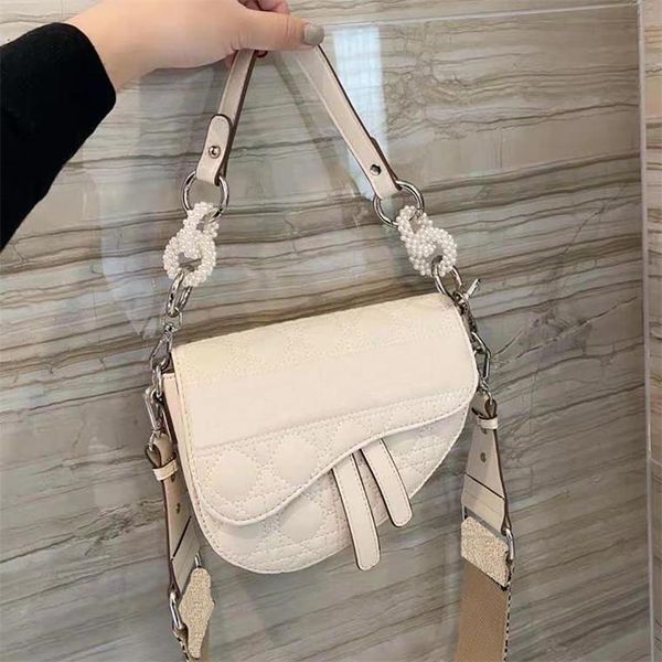 2021 brand ladies handbag crossbody shoulder bag canvas large capacity with original box and dust bags 043566
2021 brand ladies handbag crossbody shoulder bag canvas large capacity with original box and dust bags 043566