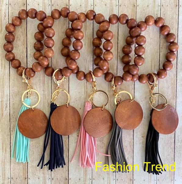 10pcs/lot 2021 selling wood bead fashionable bracelet keychain ornaments multi colors with tassel party favor
10pcs/lot 2021 selling wood bead fashionable bracelet keychain ornaments multi colors with tassel party favor