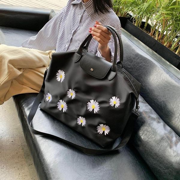 embroidered net red big bag female 2021 summer fashion solid color messenger large capacity portable travel duffel bags
embroidered net red big bag female 2021 summer fashion solid color messenger large capacity portable travel duffel bags
