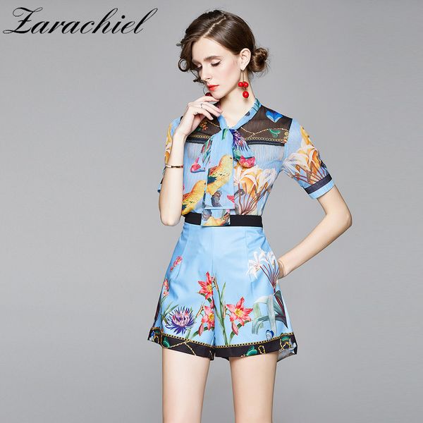 ladies chiffon two pieces ribbon bow collar beading tassels short sleeve blouse shirts + blue flower print pocket shorts set 210416, White
ladies chiffon two pieces ribbon bow collar beading tassels short sleeve blouse shirts + blue flower print pocket shorts set 210416, White