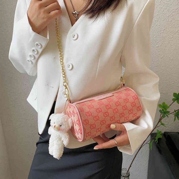 purse printed women's autumn new bear pendant sling shoulder signature cylinder messenger bag
purse printed women's autumn new bear pendant sling shoulder signature cylinder messenger bag