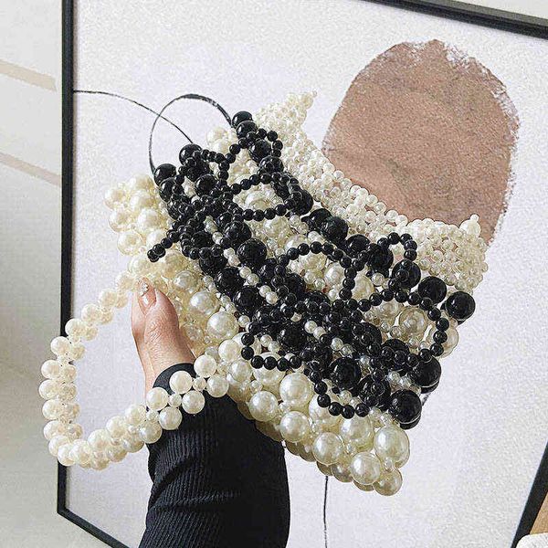 shopping bags pearl beaded designer crossbody sling for women luxury brand shoulder summer simple handbags female 220303
shopping bags pearl beaded designer crossbody sling for women luxury brand shoulder summer simple handbags female 220303