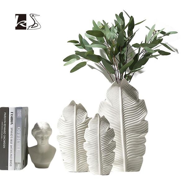 vases nordic ceramic flower vase for home decoration living room pot creative leaf shape dried flowers 
vases nordic ceramic flower vase for home decoration living room pot creative leaf shape dried flowers