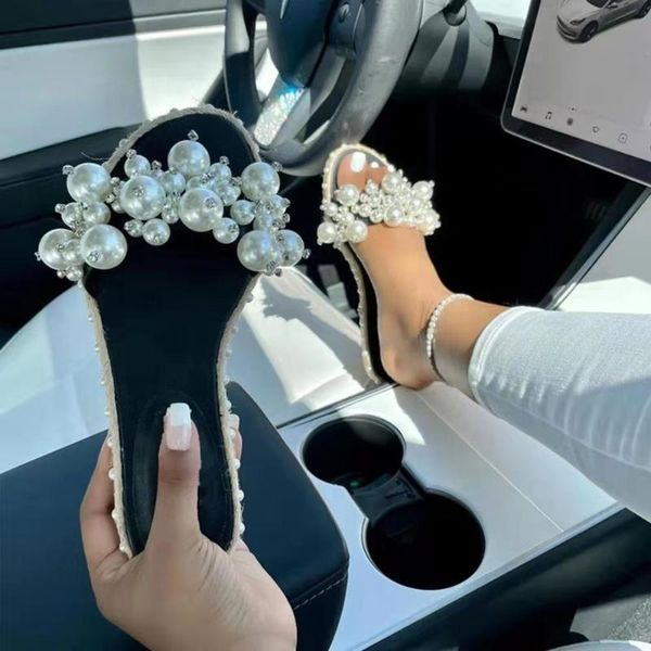 slippers ladies 2021 summer style flip flops european and american pearl sandals female spot, Black
slippers ladies 2021 summer style flip flops european and american pearl sandals female spot, Black