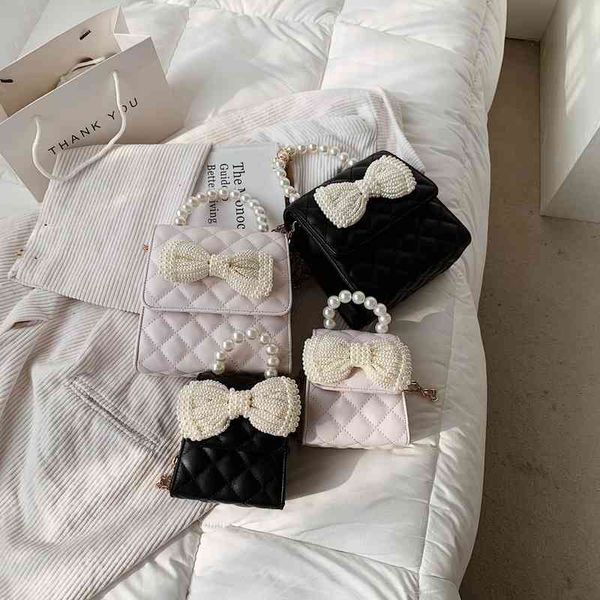 women's mini handbag bow pearl 2021 spring and summer korean fashion one shoulder messenger chain bag
women's mini handbag bow pearl 2021 spring and summer korean fashion one shoulder messenger chain bag