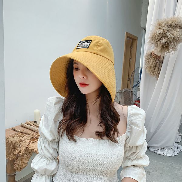 female summer anti show face small fisherman's designer beach sun open big brim hat 
female summer anti show face small fisherman's designer beach sun open big brim hat