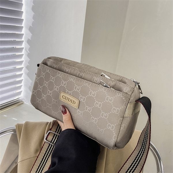purse leisure women's new light and versatile signature canvas mini mobile phone bag oxford one shoulder messenger bag
purse leisure women's new light and versatile signature canvas mini mobile phone bag oxford one shoulder messenger bag