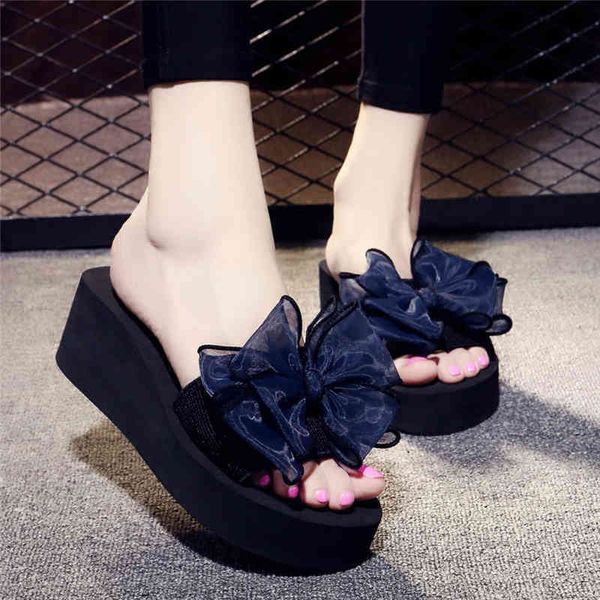 sandals summer women's bow slippers high heeled flip flop fashion slope heel thick sole beach, Black
sandals summer women's bow slippers high heeled flip flop fashion slope heel thick sole beach, Black