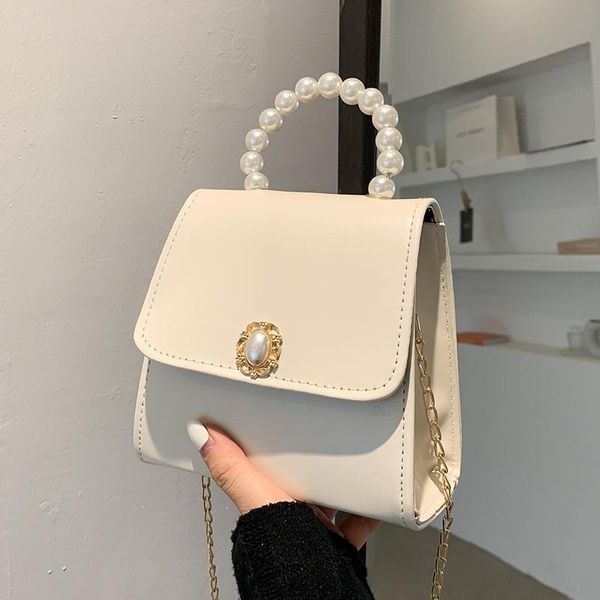 evening bags high-quality summer solid color foreign style handbag 2021 fashion all-match women's designer pearl portable messenger bag
evening bags high-quality summer solid color foreign style handbag 2021 fashion all-match women's designer pearl portable messenger bag