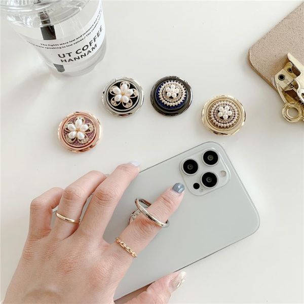 cell phone mounts & holders fashion luxury universal glitter pearl jewelled flower metal round stand holder for sa
cell phone mounts & holders fashion luxury universal glitter pearl jewelled flower metal round stand holder for sa