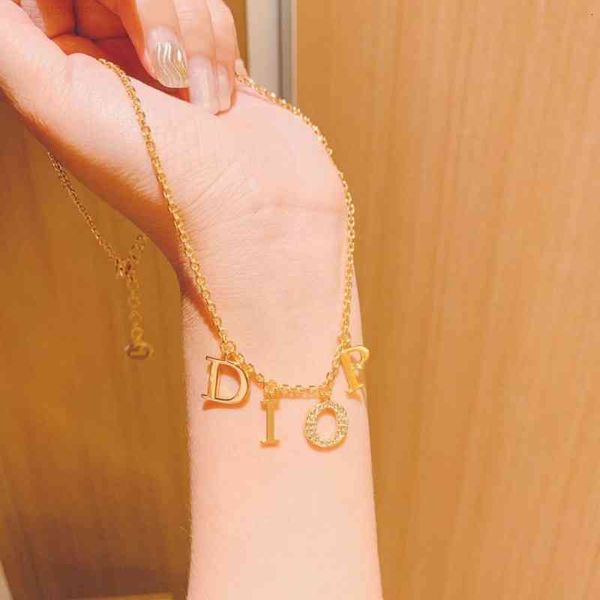dio/christian letter brass star pearl cd thick chain texture diamond necklace, Red;brown
dio/christian letter brass star pearl cd thick chain texture diamond necklace, Red;brown