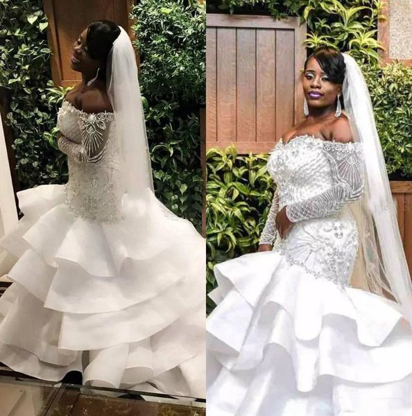 plus size mermaid wedding dress off shoulder backless crystal african bridal gowns beach abiti da sposa saudi arabic dresses, White
plus size mermaid wedding dress off shoulder backless crystal african bridal gowns beach abiti da sposa saudi arabic dresses, White
