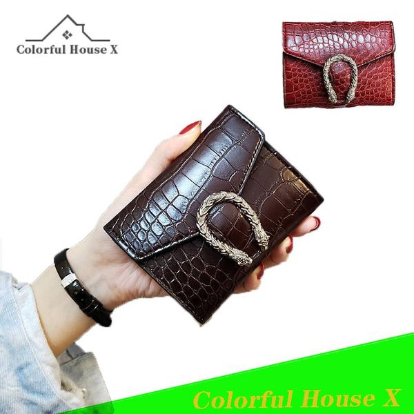 european and american retro wallet women's short folding purse korean personalized versatile zero female cosmetic bag storage bags
european and american retro wallet women's short folding purse korean personalized versatile zero female cosmetic bag storage bags