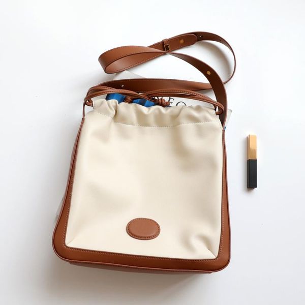 evening bags contrasting color stitching leather drawstring tote bag 2021 trendy large-capacity shoulder casual shopping
evening bags contrasting color stitching leather drawstring tote bag 2021 trendy large-capacity shoulder casual shopping
