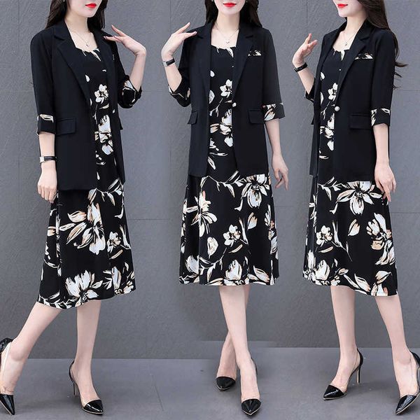 two piece women's with printed cuffs, beaded button suit coat and lotus bottom skirt, Black;gray
two piece women's with printed cuffs, beaded button suit coat and lotus bottom skirt, Black;gray