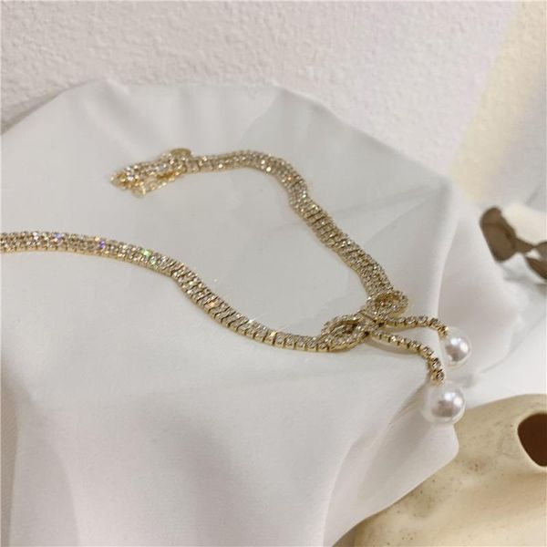 chokers korean fashion luxury sparkling zircon inlaid choker necklace for women girls sweet pearl bowknot clavicle jewelry, Golden;silver
chokers korean fashion luxury sparkling zircon inlaid choker necklace for women girls sweet pearl bowknot clavicle jewelry, Golden;silver