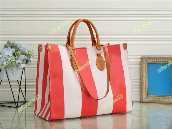 fashion new tote women designer onthego handbags genuine leather handbag messenger bag shoulder pockets totes
fashion new tote women designer onthego handbags genuine leather handbag messenger bag shoulder pockets totes
