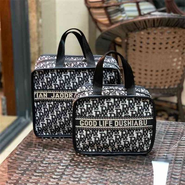 design new fan letter large capacity cosmetic storage portable washing women's mommy lunch box bag handbags
design new fan letter large capacity cosmetic storage portable washing women's mommy lunch box bag handbags