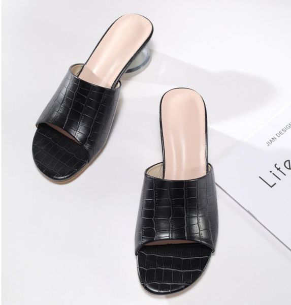 the 2021 features a tapered crystal heel sandal, stylish transparent with square head and medium sandal in stone slippers1, Black
the 2021 features a tapered crystal heel sandal, stylish transparent with square head and medium sandal in stone slippers1, Black