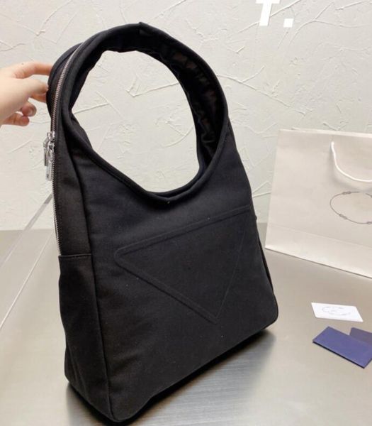 classic shopping tote bags luxury designer famous brand high qualiry womens mens large capacity street travel holidy fashion triangle sign h
classic shopping tote bags luxury designer famous brand high qualiry womens mens large capacity street travel holidy fashion triangle sign h