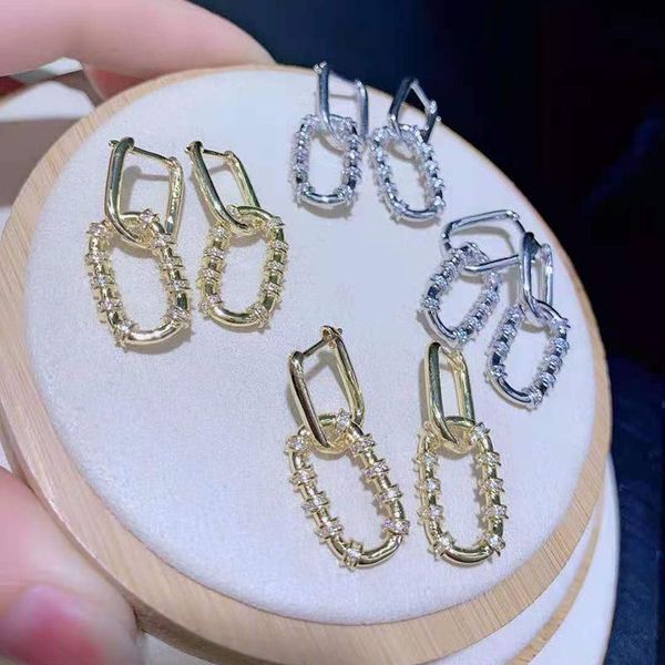 2pairs/lot women's style oval shaped gold color charm cz earrings hoop & huggie, Golden;silver
2pairs/lot women's style oval shaped gold color charm cz earrings hoop & huggie, Golden;silver