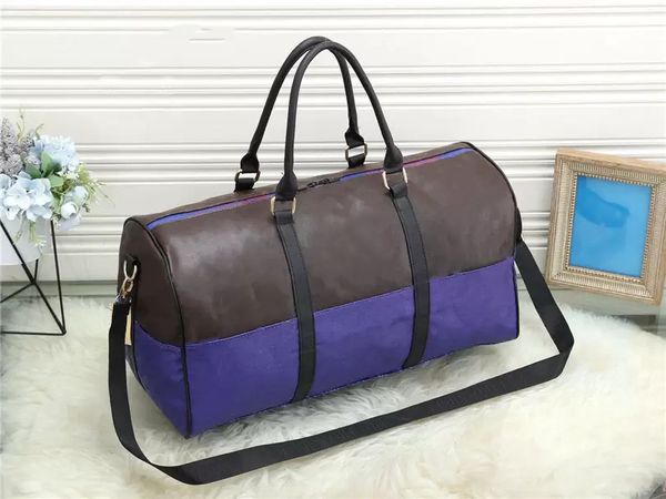 yq luxury fashion men women travel bag duffle bags, brand designer pu leather luggage handbags large capacity sport bag
yq luxury fashion men women travel bag duffle bags, brand designer pu leather luggage handbags large capacity sport bag