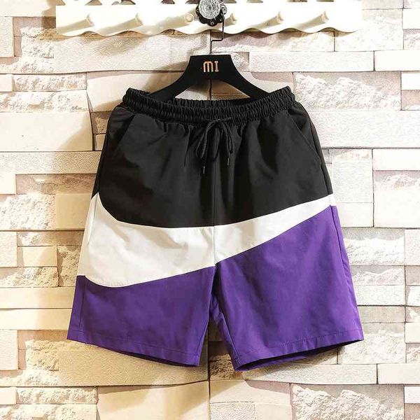 2021 summer men's shorts korean fashion color blocking sports beach pants loose couple large underpants, White;black
2021 summer men's shorts korean fashion color blocking sports beach pants loose couple large underpants, White;black