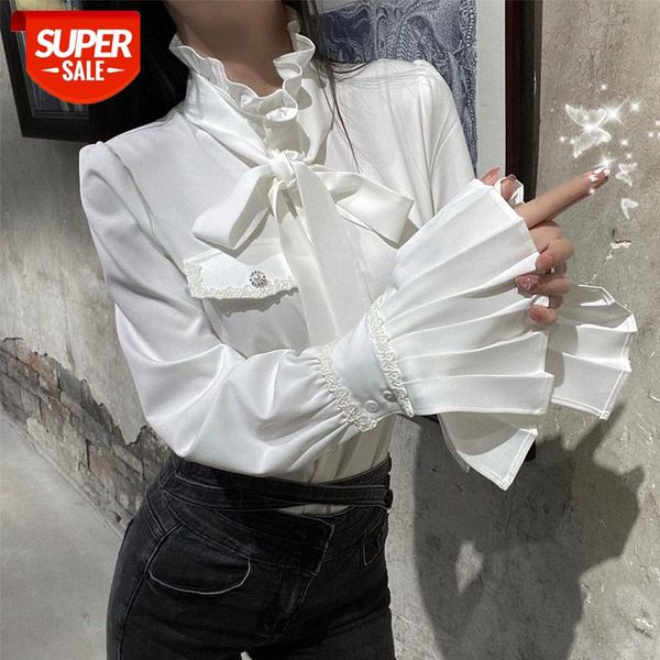 shirt female design sense retro white temperament gentle bottoming trumpet sleeve bow blouse can be issued on behalf of #d31c
shirt female design sense retro white temperament gentle bottoming trumpet sleeve bow blouse can be issued on behalf of #d31c