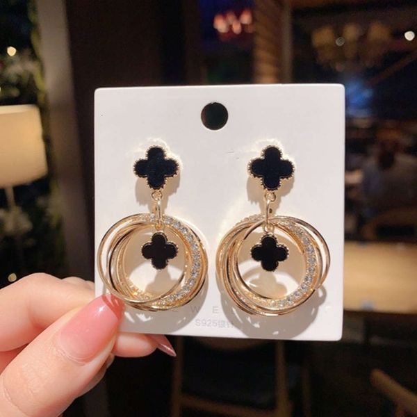 925 silver needle advanced french tassel femininity geometric pentagram earrings simple versatile pendant, Black
925 silver needle advanced french tassel femininity geometric pentagram earrings simple versatile pendant, Black