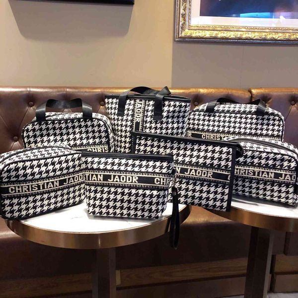 handbag canvas black and white thousand bird lattice portable cosmetic bag fashion large capacity mommy simple storage, Black;red
handbag canvas black and white thousand bird lattice portable cosmetic bag fashion large capacity mommy simple storage, Black;red