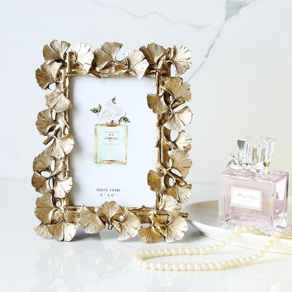 frames and mouldings selling european retro po frame resin creative gold ginkgo leaf luxury wedding home decoration crafts
frames and mouldings selling european retro po frame resin creative gold ginkgo leaf luxury wedding home decoration crafts