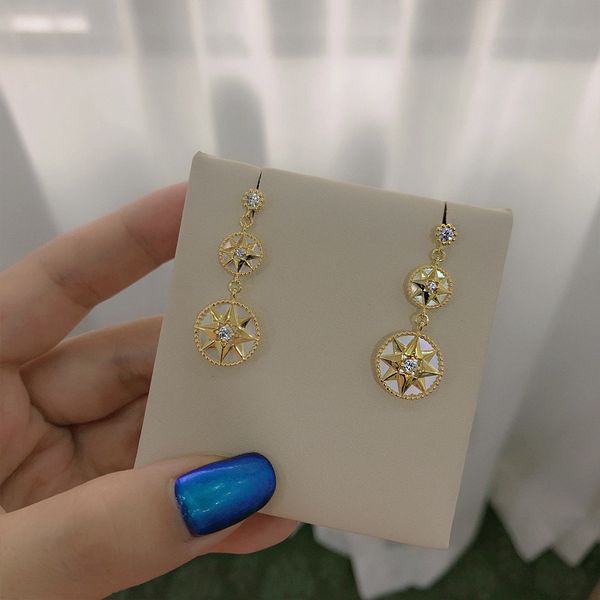 2021 new designer high end compass six star white fritillaria earrings sterling silver and korean jewelry earrings, Golden
2021 new designer high end compass six star white fritillaria earrings sterling silver and korean jewelry earrings, Golden