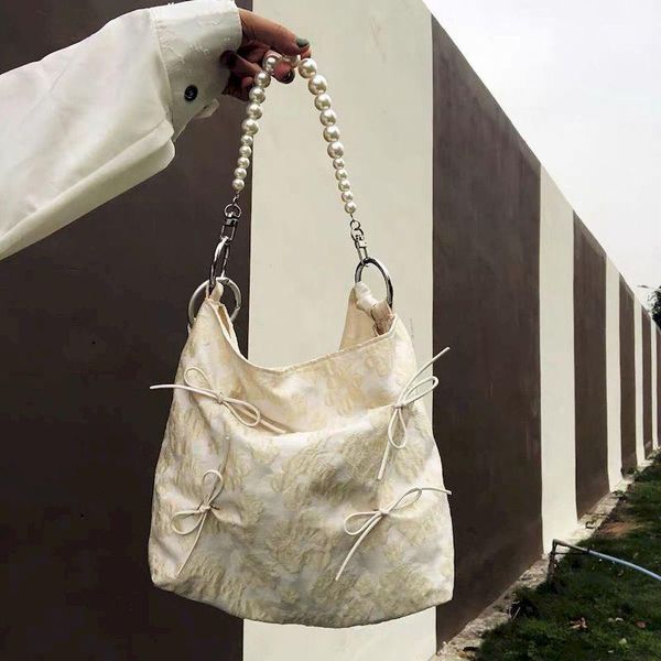 waist bags retro niche jacquard tote bag 2021 spring and summer fashionable bow pearl single shoulder diagonal female waistbag
waist bags retro niche jacquard tote bag 2021 spring and summer fashionable bow pearl single shoulder diagonal female waistbag