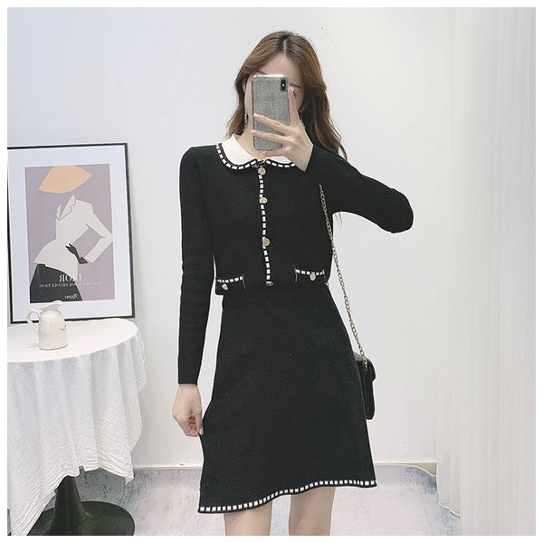 autumn women 2 piece set single breasted turn down collar cardigan sweater + a line knitting casual mini skirt suits 210514, White
autumn women 2 piece set single breasted turn down collar cardigan sweater + a line knitting casual mini skirt suits 210514, White