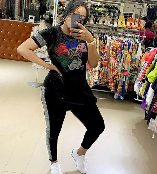 women's two piece pants 2021 summer casual women fashion african street print short sleeve round collar two-piece set, White
women's two piece pants 2021 summer casual women fashion african street print short sleeve round collar two-piece set, White