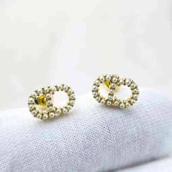 classic inlaid small pearl light gold 925 silver needle earrings front and back earrings, Golden;silver
classic inlaid small pearl light gold 925 silver needle earrings front and back earrings, Golden;silver