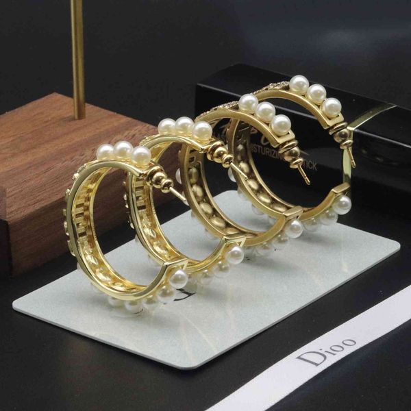 aaa designer jewelry 2021 new pearl letter diamond female net red brass s925 silver needle earrings, Golden
aaa designer jewelry 2021 new pearl letter diamond female net red brass s925 silver needle earrings, Golden