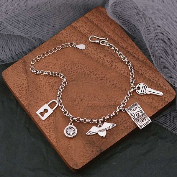 japanese and korean fashion new love wings gold thai silver bracelet women's hip hop key lock pendant, Black
japanese and korean fashion new love wings gold thai silver bracelet women's hip hop key lock pendant, Black