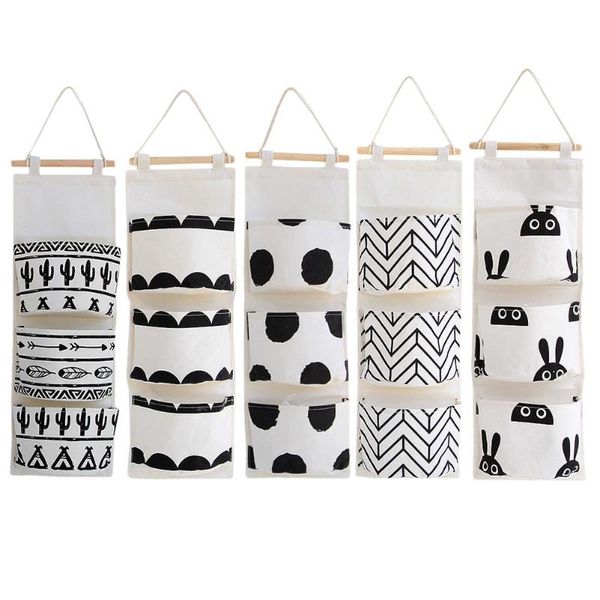 storage boxes & bins black white pattern cotton linen hanging bag 3 pockets wall mounted wardrobe hang pouch cosmetic toys organizer
storage boxes & bins black white pattern cotton linen hanging bag 3 pockets wall mounted wardrobe hang pouch cosmetic toys organizer