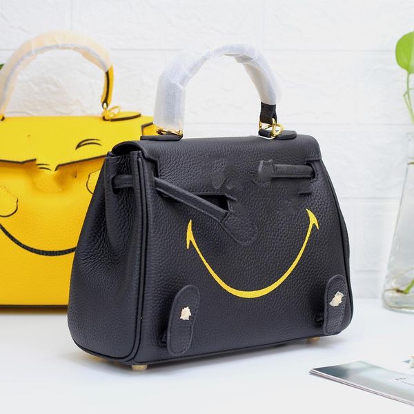 designer bagssmiley face kl bag dont worry be happy portable messenger lady cute feet lucky leather fashion layer cowhideluxury bag
designer bagssmiley face kl bag dont worry be happy portable messenger lady cute feet lucky leather fashion layer cowhideluxury bag
