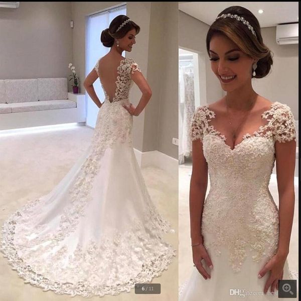 2021 latest style white tulle a line wedding dress lace appliques beaded cap sleeve court train long bridal gowns summer beach open back bri
2021 latest style white tulle a line wedding dress lace appliques beaded cap sleeve court train long bridal gowns summer beach open back bri