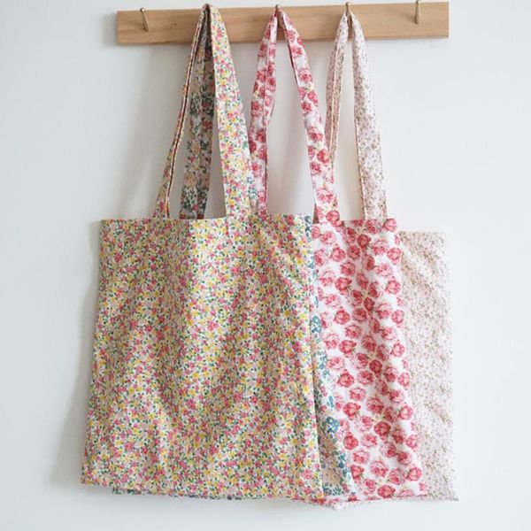 small flower cloth bag handmade cotton mori woman fresh thin versatile shoulder storage bags 
small flower cloth bag handmade cotton mori woman fresh thin versatile shoulder storage bags