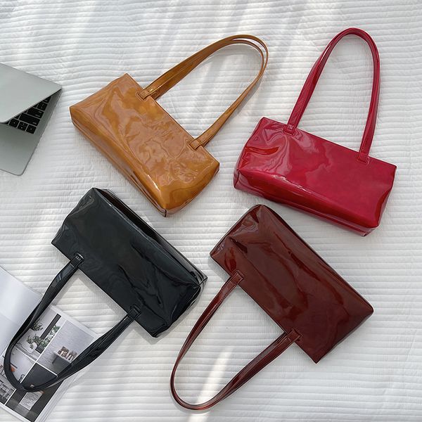 new solid color high texture hand small simple women's shoulder fashion bright face shaped armpit bag
new solid color high texture hand small simple women's shoulder fashion bright face shaped armpit bag