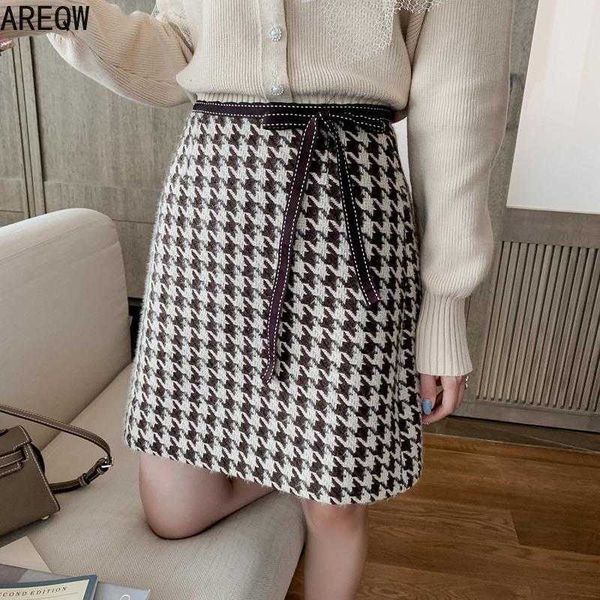 skirt women's autumn and winter retro houndstooth woolen a- line tweed skirt college style 210709, Black
skirt women's autumn and winter retro houndstooth woolen a- line tweed skirt college style 210709, Black